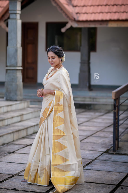 Golden Tissue Saree with Bottle Temple Motifs