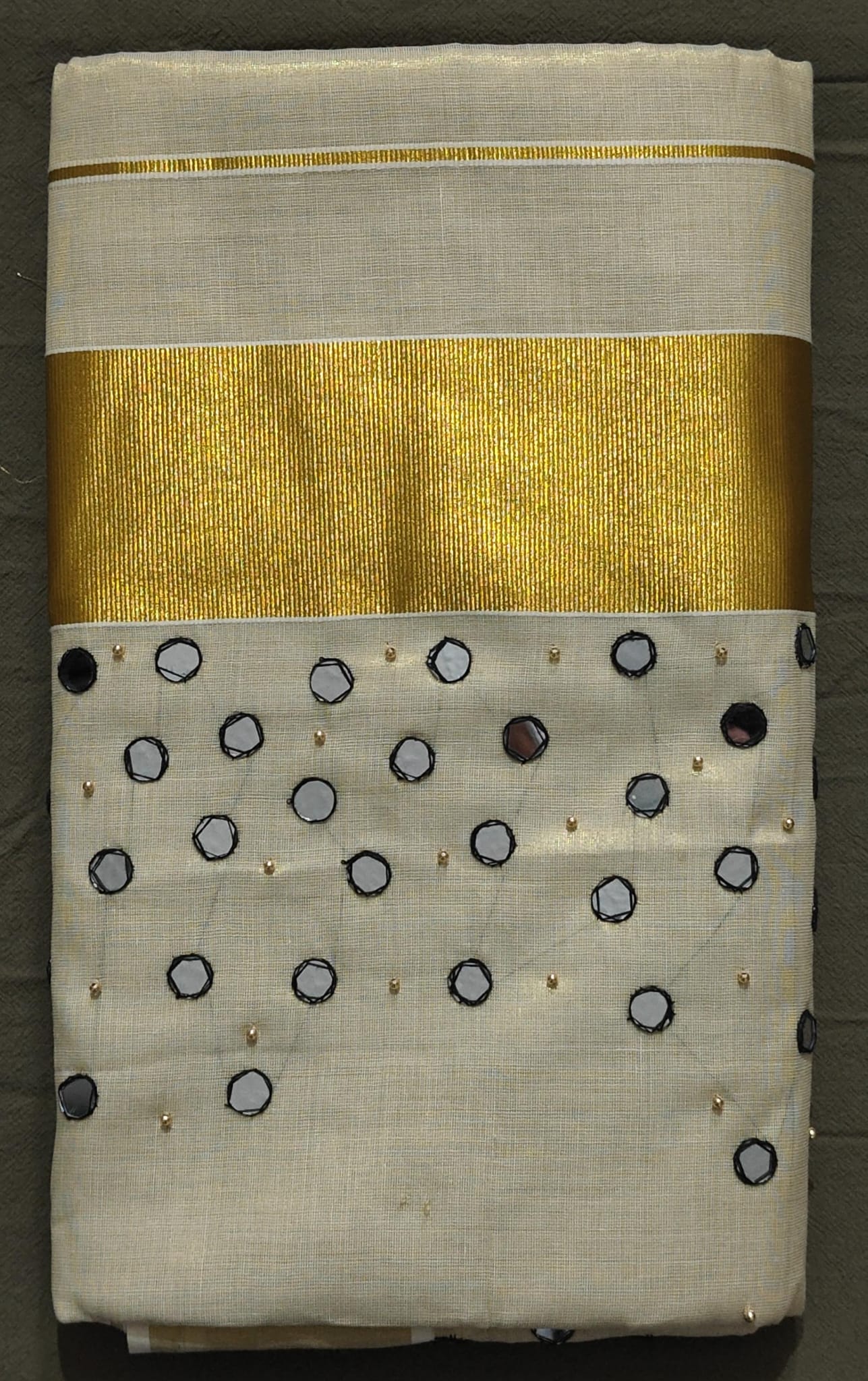 tissue saree with mirror work on it