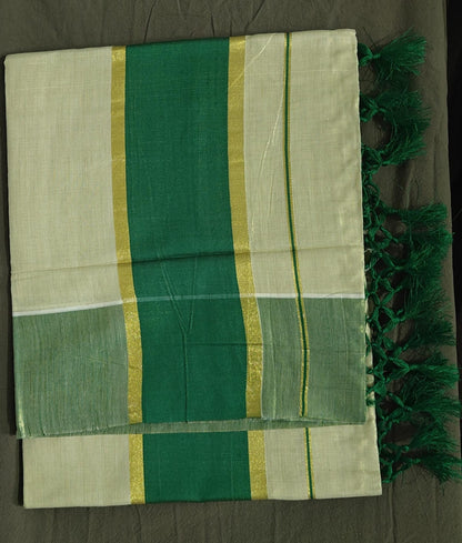 Green and white striped set saree with tassels on a dark background