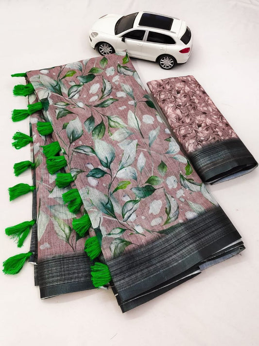 Floral patterned saree with green tassels and a small car model on a white background