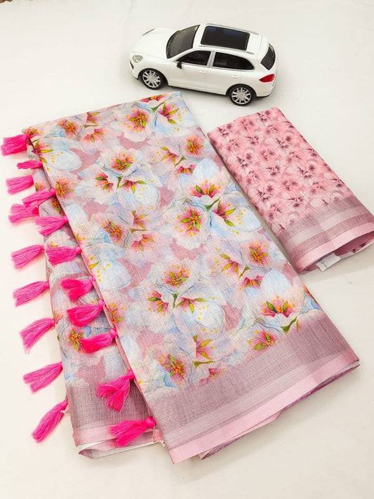 Floral patterned saree with pink tassels and a small white car model on a white background