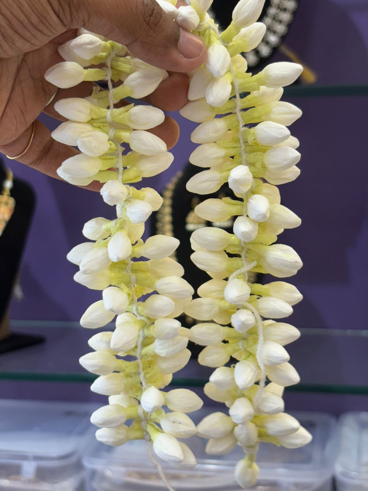 Artificial Mulla Mala jasmine garland made from processed paper, traditional hair accessory for women.
