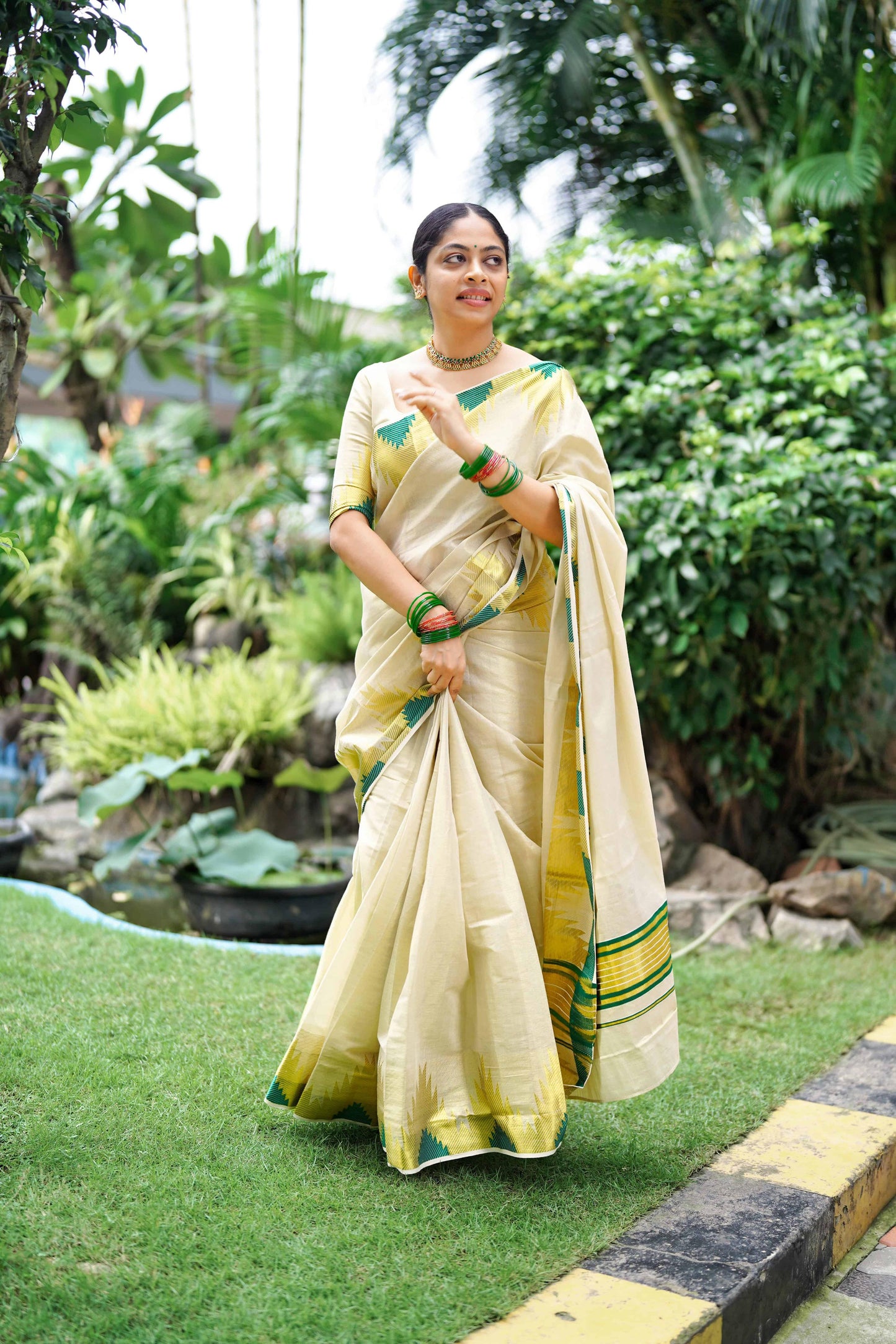 Golden Tissue Saree with Bottle Green Temple Motifs