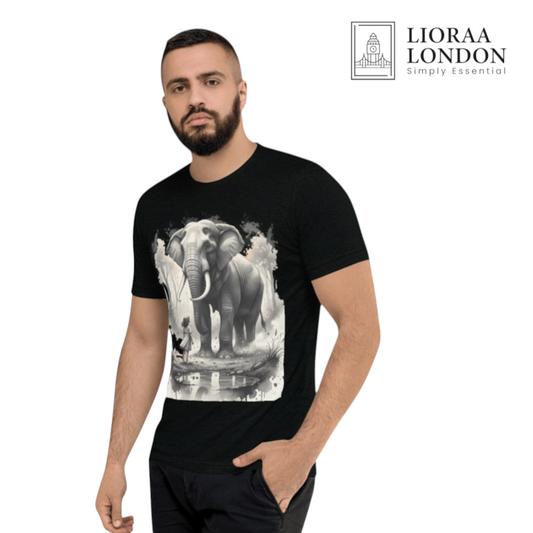 Man wearing a Lioraa London Ltd black cotton t-shirt with a surreal elephant and girl watercolour graphic print.