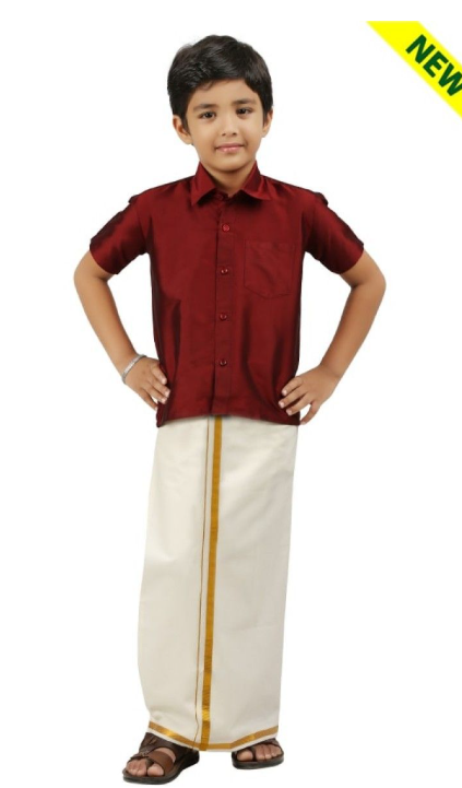 Child wearing a maroon shirt and Velcro Onam Dothi