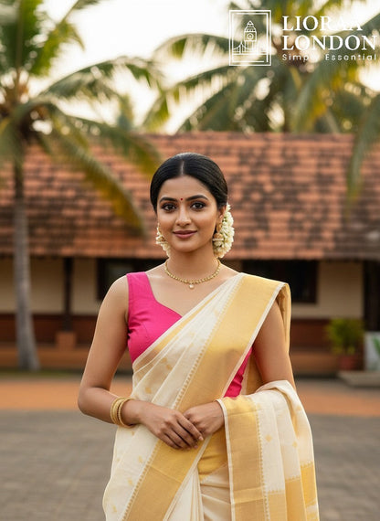 Lioraa London Ltd gajri colour cotton silk blouse with sweetheart neckline worn with a traditional cream saree