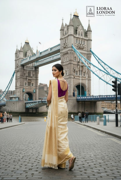 Lioraa London Ltd purple rani silk blouse with sweetheart neckline and deep U-back worn with a cream saree in London.