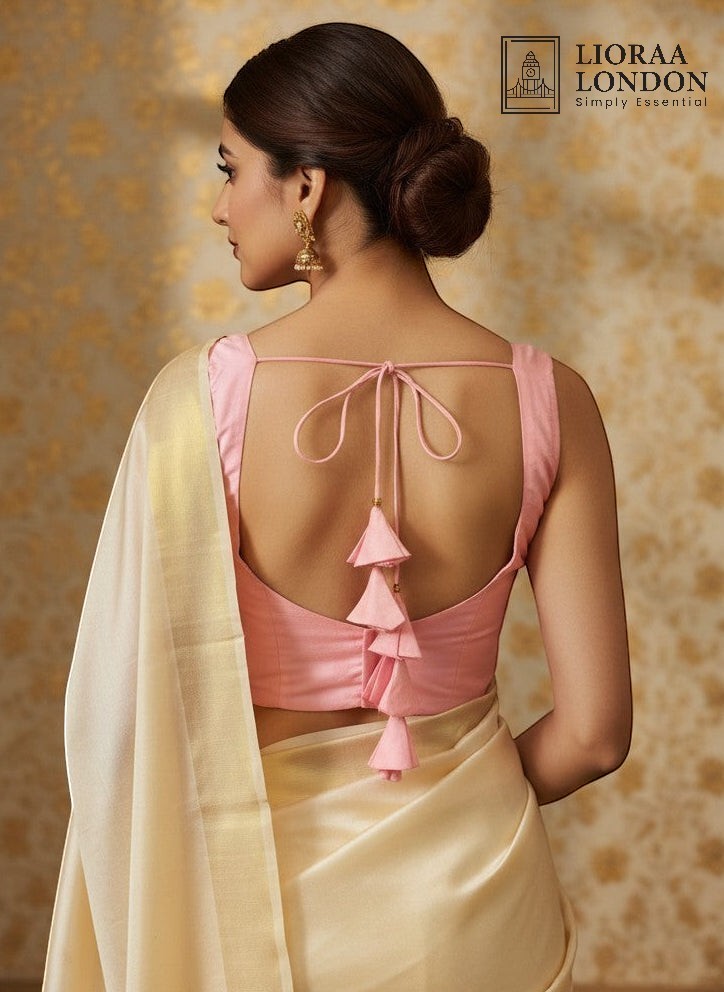Elegant peach pink silk blouse with sweetheart neckline, padded sleeves & alterable 40–46 fit. Free UK delivery.