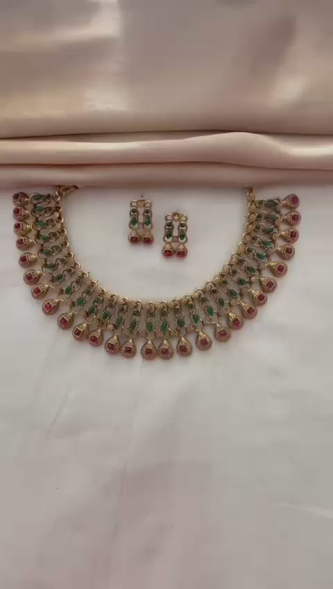 Golden Neck Set with Earrings – Green & Red Accents